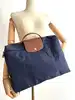porte-documents longchamp le pliage en toile bleu