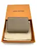 portefeuille compact louis vuitton cléa en cuir mogogram de couleur tourelle