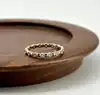 20014310 bague tour américain sertie de petits oxydes ronds t58