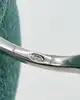 bague bague solitaire centrée d'un oxyde épaulé de 2 lignes de petits oxydes argent 925 millième (22 ct) 3,01g