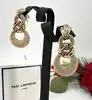 boucles d'oreilles vintage ted lapidus plaqué or
