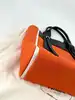 sac à main prada ouverture en toile orange et cuir noir