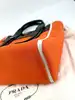 sac à main prada ouverture en toile orange et cuir noir