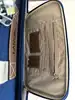 sacoche porte-documents/sac de voyage lancel bleu marine en toile et cuir avec cadenas et clés