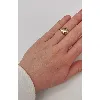 bague en plaqué or avec oxyde entouré de 2 mains
