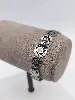 bracelet acier fleurs avec pierre blanche