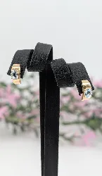 boucles d'oreilles demie-créoles chacune sertie d'une aigue-marine or 750 millième (18 ct) 2,31g