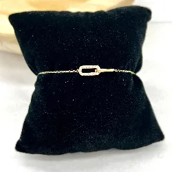 35990 bracelet pl-or motif maillons rectangulaires entrelacés orné d'oxydes