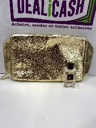 trousse yves saint laurent dorée