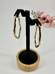 3603709 boucles d'oreilles créoles épaisses vague en acier doré