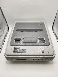 console nintendo super nes snes avec une manette