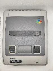 console nintendo super nes snes avec une manette