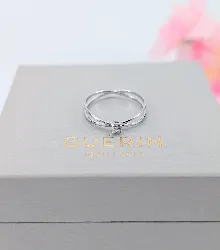 bague guérin en or blanc centrée d'un petit diamant or 750 millième (18 ct) 1,06g