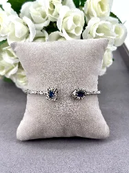 bracelet jonc ouvert en métal argenté avec oxydes bleus