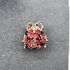 broche motif coccinelle pavée d'oxydes