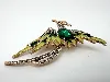 broche phénix en métal doré clair et émaillé ornée des strass blancs et vert