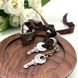 cadenas hermès argenté avec 2 clès