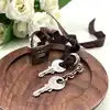 cadenas hermès argenté avec 2 clès