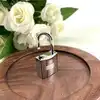 cadenas hermès argenté avec 2 clès