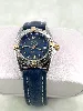 montre breitling callistino b52045 mouvement quartz en acier & or jaune, bracelet en cuir bleu