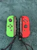 paire de joycon officiel nintendo vert et rouge