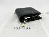 portefeuille coach à bouton pression en cuir noir