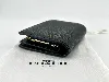 portefeuille coach à bouton pression en cuir noir
