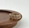 20014310 bague tour américain sertie de petits oxydes ronds t56