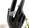 bague apm monaco fleurs et perle, pavée de zirconiums  t52 argent 925 millième (22 ct) 3,53g