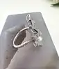 bague apm monaco fleurs et perle, pavée de zirconiums  t52 argent 925 millième (22 ct) 3,53g