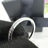 bague apm monaco pierre verte & demi-tour pavé zirconiums blancs t54 argent 925 millième (22 ct) 3,24g
