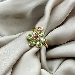 bague ouverte à motif floral ornée d’oxydes, en métal doré