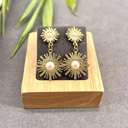 boac boucles d'oreilles à motif soliel