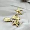 boac boucles d'oreilles en acier motif étoile de mer