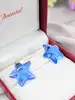 boucles d'oreilles baccarat starlet bleu en cristal et or jaune or 750 millième (18 ct) 16,38g