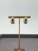 boucles d'oreilles forme goutte d'eau en acier doré