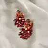 boucles d'oreilles pendantes motif corail