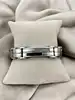 bracelet en acier bicolore noir et câble