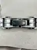 bracelet en acier bicolore noir et câble