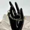 bracelet maille forçat en métal doré