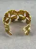 bracelet manchette motif feuille de ginkgo en acier doré