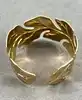 bracelet manchette motif feuille en acier doré