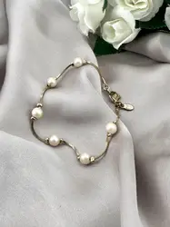 bracelet métal doré avec perles synthétique