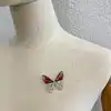 broche broche papillon rose et doré