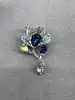 broche fleur pavé d'oxydes