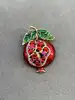 broche grenadeen émail avec oxydes