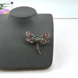broche motif libellule pavé d'oxydes