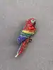 broche perroquet pavé d'oxydes