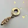 charm pandora feuille de chêne avec cristaux violets et roses