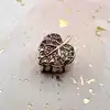 charm pandora feuille pavé scintillant en or rose avec cristaux dégrades rose et violet
